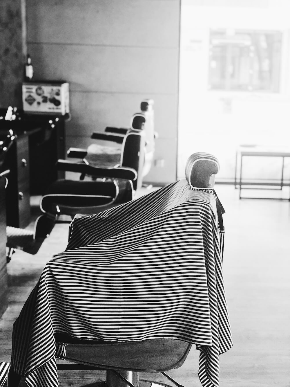 Professional barber chair prepared for a haircut