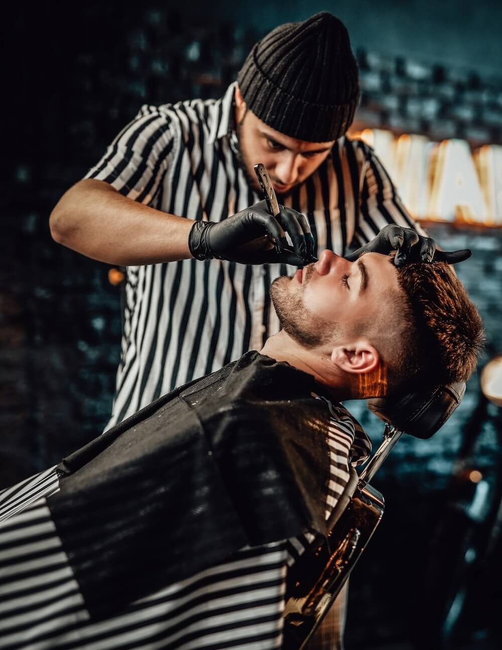 Professional barber working in a barber shop